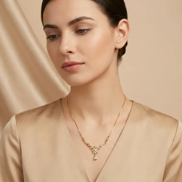 Gold_Toned_Floral_Pendant_Necklace_With_Delicate_Chain