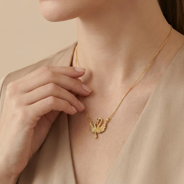 Elegant_Gold_Toned_Swan_Pendant_Necklace