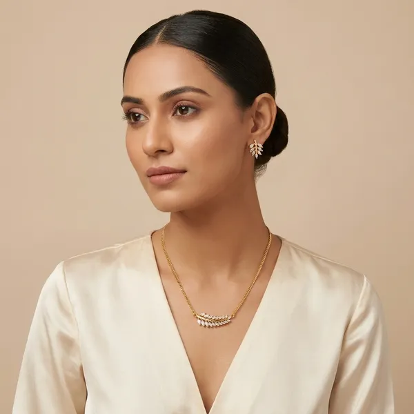 Elegant_Gold_Plated_Leaf_Design_Necklace_And_Earrings_Set_With_White_Crystals