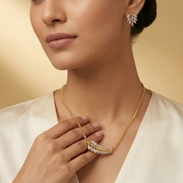 Elegant_Gold_Plated_Leaf_Design_Necklace_And_Earrings_Set_With_White_Crystals