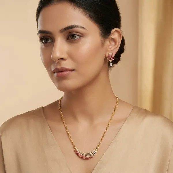 Traditional_Gold_Toned_Necklace_Set_With_Pink_Stone_Detailing