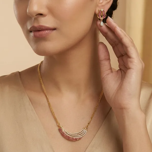 Traditional_Gold_Toned_Necklace_Set_With_Pink_Stone_Detailing