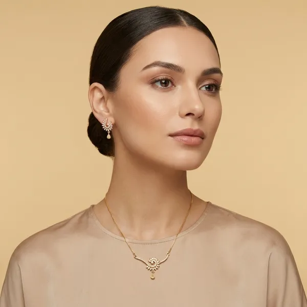Elegant_Golden_Leaf_Necklace_And_Earring_Set_With_Sparkling_Stones