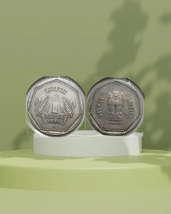 India_-_1986_-_1_RUPEE_HYDERABAD_MINT_Used_COIN