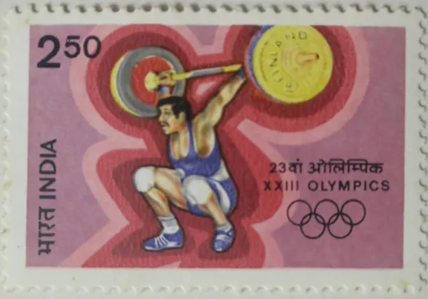 India_-_1984_-_XXIII_Olympic_Games,_Los_Angeles._Weightlifting_-_MNH_Stamp_(Face_value:.50_per_stamp)_-_Pack_of_2