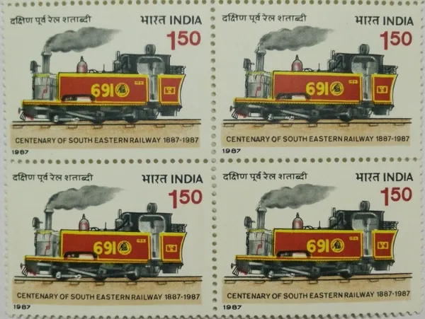 India_-_1987_-_Centenary_of_South_Eastern_Railway,_PL_Type_Narrow_Gauge_Locomotive_on_Naupada-Gurupur_(Block_of_4_stamp)_-_MNH