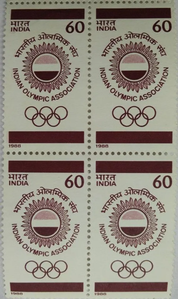 India_-_Sports_-_1988,_Indian_Olympic_Association_Sports,_Emblem,_Olympic_Games,_Olympic_Rings_60_P_Commemorative_(Block_Of_4_Stamp)_-_MNH