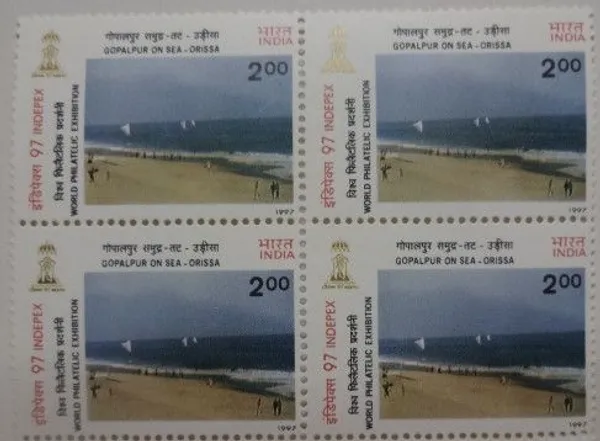 India_-_1997_-_INDEPEX97_International_stamp_Exhibition,_New_Delhi_Beacher_of_India,_Gopalpur-on-sea,_Orissa_(Block_of_4_stamp)_-_MNH