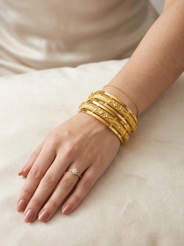 Set_of_2_Gold_Plated_with_Engraved_Floral_Design_Bangles__For_Women