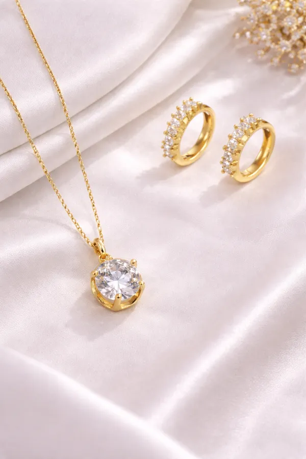 Solitaire_Pendant_&_Pavé_Huggie_Hoop_Set