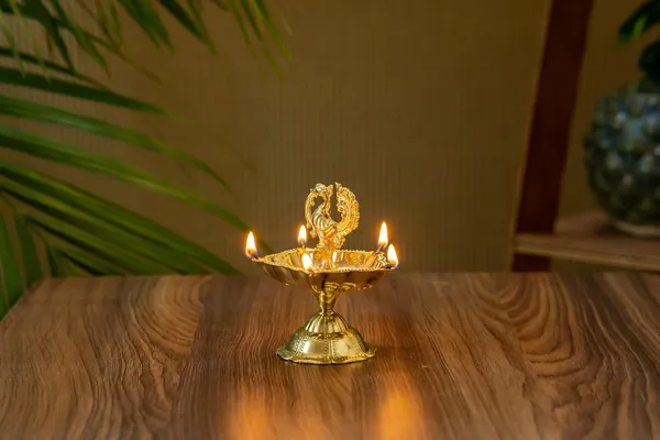Gold_Brass_Peacock_Diya_For_Wall_Decor