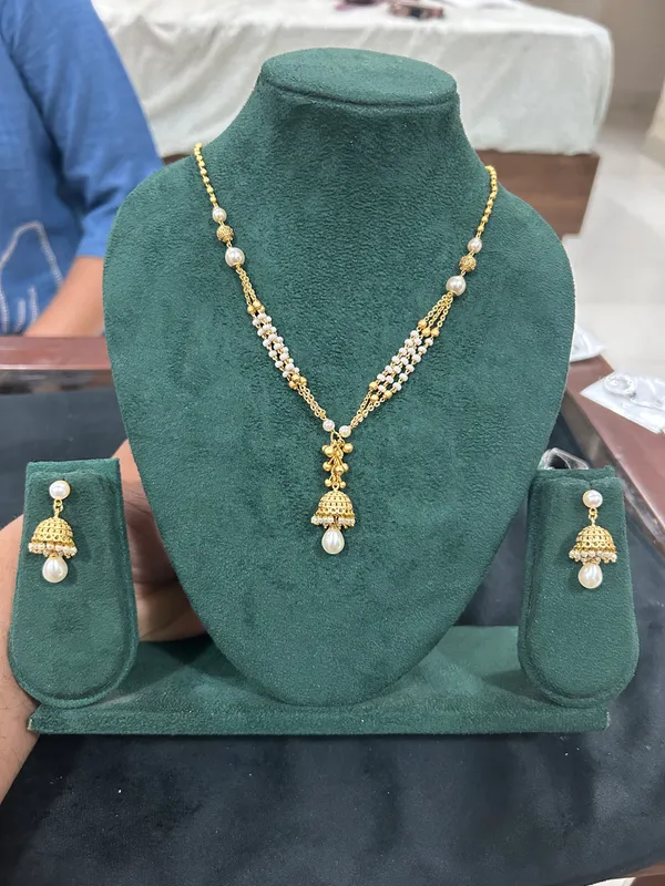 Pearl_&_Gold_Jhumka_Pendant_Necklace_Set