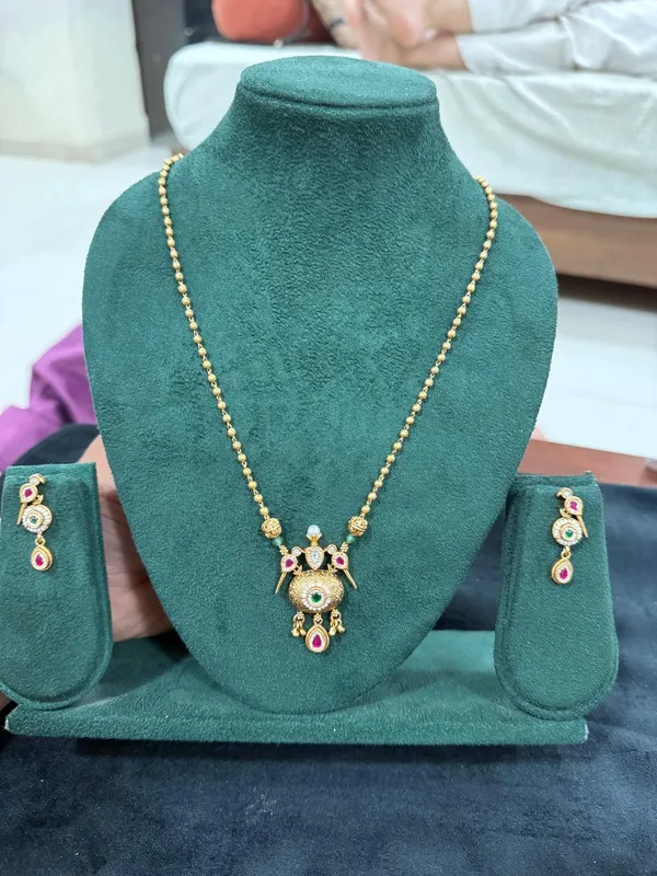 Antique_Gold_Peacock_Necklace_Set_with_Ruby_&_Emerald_Drops