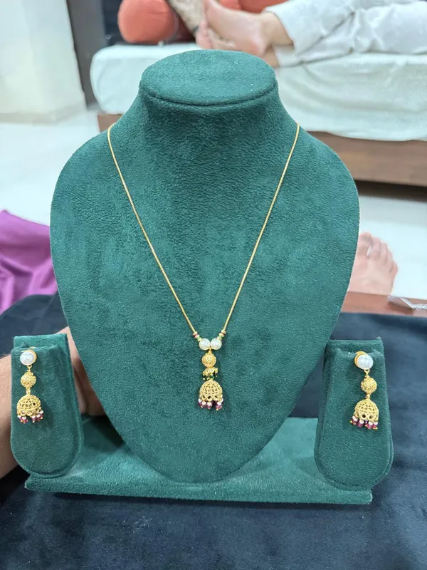 Gold_Filigree_Jhumka_Pendant_Necklace_Set_with_Pearl_&_Ruby_Drops