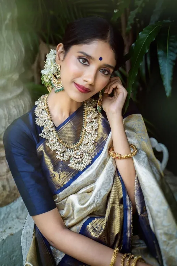 Anika_Regal_Champagne_Gold_&_Deep_Plum_Lichi_Silk_Saree_with_Antique_Zari_Elegance