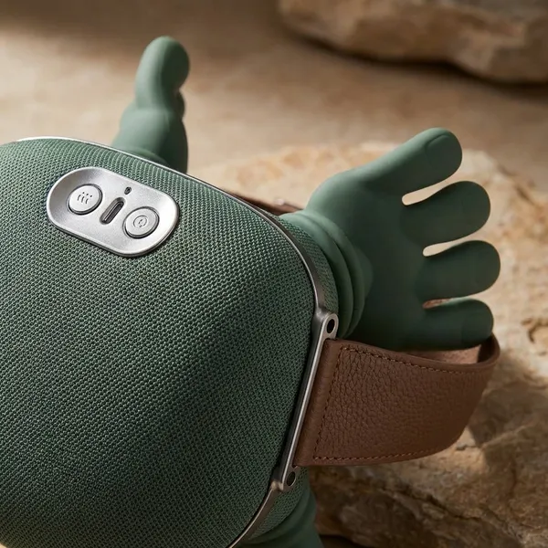Green_Fabric_And_Foam_And_Plastic_Massager_For_Relaxation_And_Pain_Relief