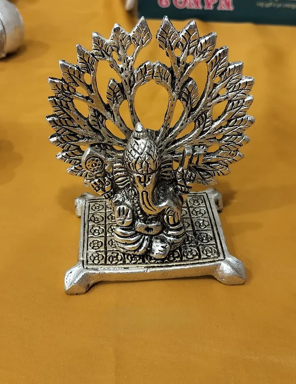 Germen_Silver_Peacock_Showpiece_With_Spread_Feathers_On_Ornate_Base