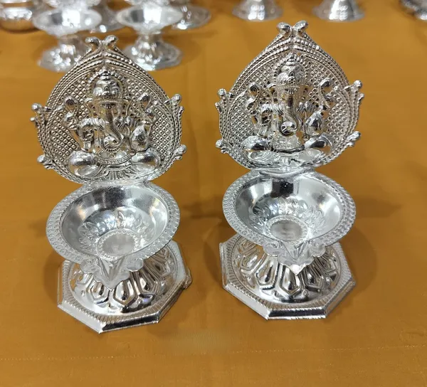 Germen_Silver_Decorative_Silver_Plated_Lakshmi_Diya_Set_With_Stand_Set_Of_2