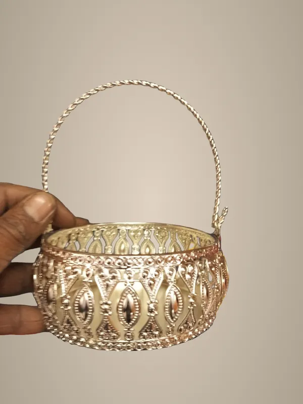 Decorative_Gold-Toned_Metal_Basket_With_Intricate_Cutout_Design