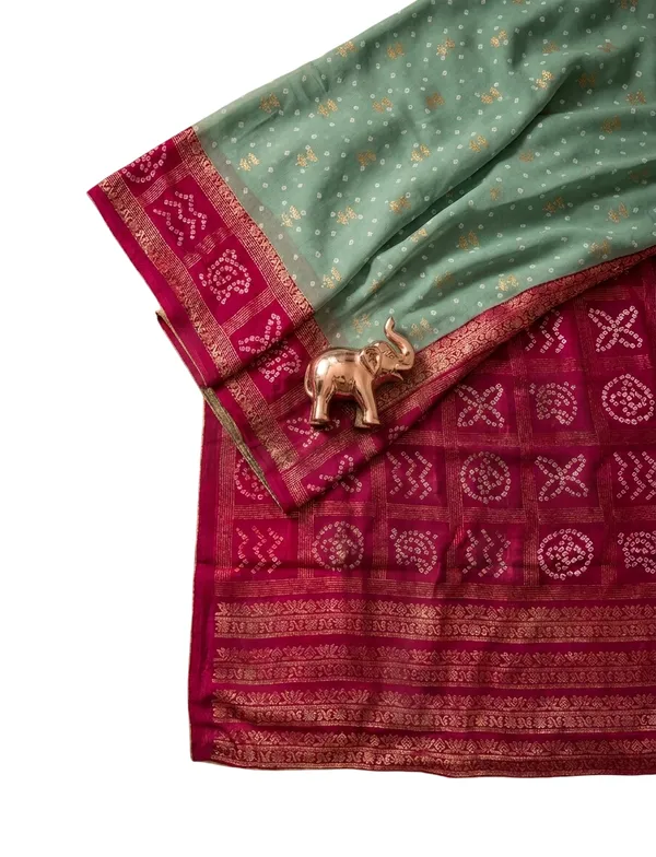 Women's_Georgette_Bandhani_Saree_with_Contrast_Rani_Pink_Zari_Border_and_Geometric_Pallu_|_Traditional_Rajasthani_Bandhej_Tie-Dye_Saree