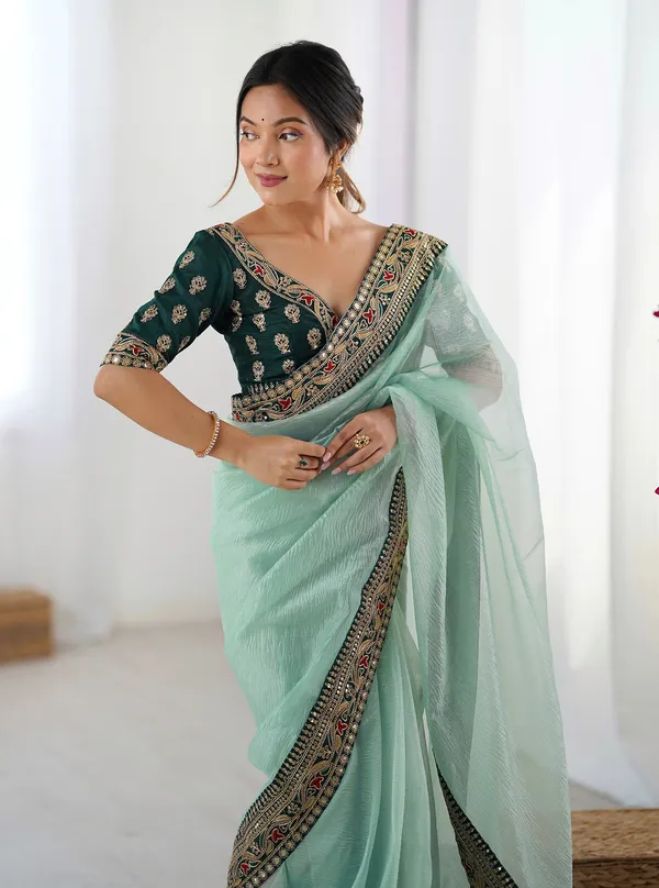 Shimmer_Net_Traditional_Motif_Embroidered_Saree_With_Blouse_Piece