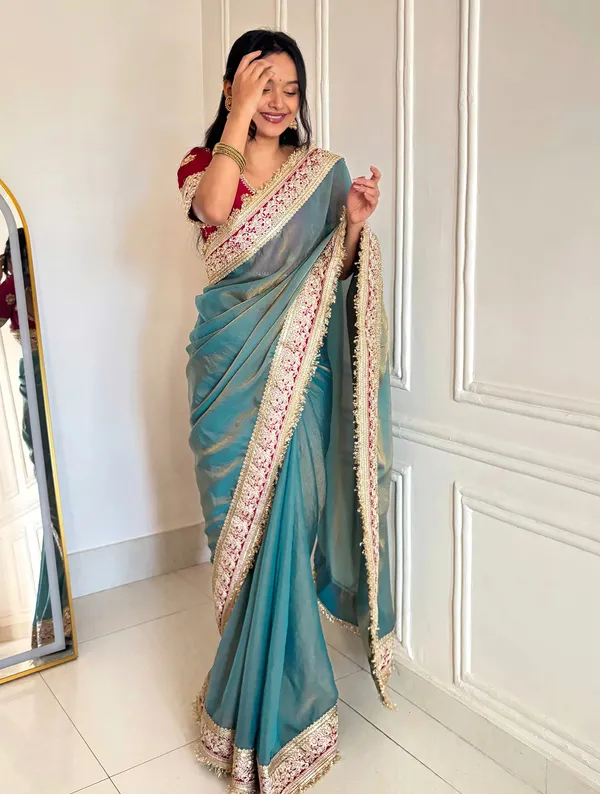 Shimmer_Silk_Traditional_Motif_Embroidered_Saree_With_Blouse_Piece