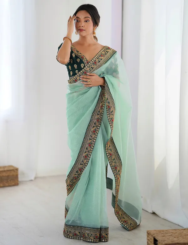 Shimmer_Net_Traditional_Motif_Embroidered_Saree_With_Blouse_Piece