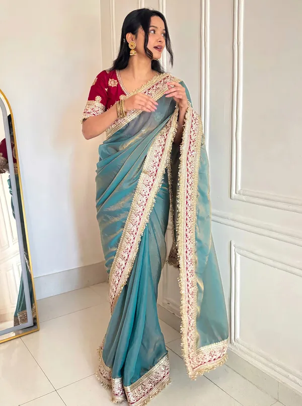 Shimmer_Silk_Traditional_Motif_Embroidered_Saree_With_Blouse_Piece