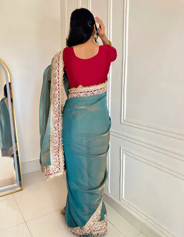 Shimmer_Silk_Traditional_Motif_Embroidered_Saree_With_Blouse_Piece