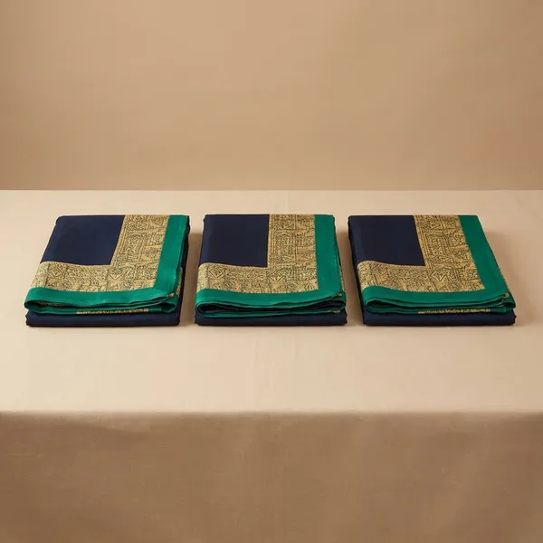 Unstitched_Navy_Blue_And_Gold_Crepe_Unstiched_Saree_With_Green_Border_(Saree-5_M,_Blouse-_0.8_M)