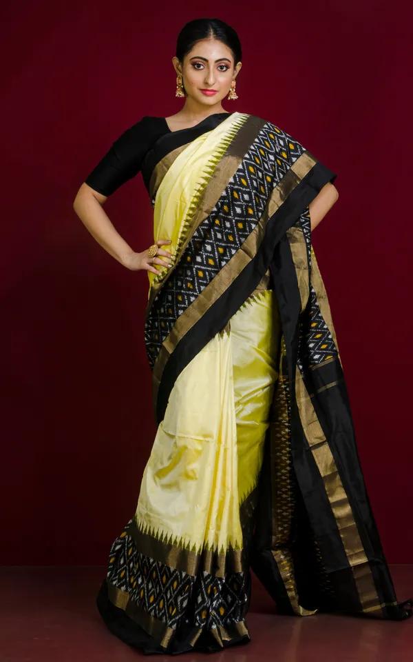 Designer_Skirt_Border_Ikkat_Pochampally_Silk_Saree_In_Cream_Black_And_Antique_Gold