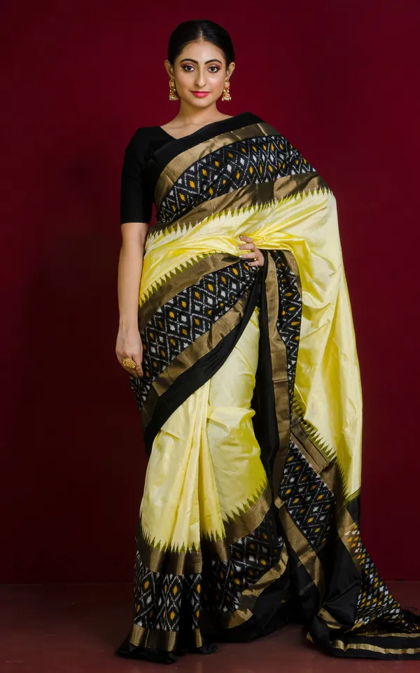 Designer_Skirt_Border_Ikkat_Pochampally_Silk_Saree_In_Cream_Black_And_Antique_Gold
