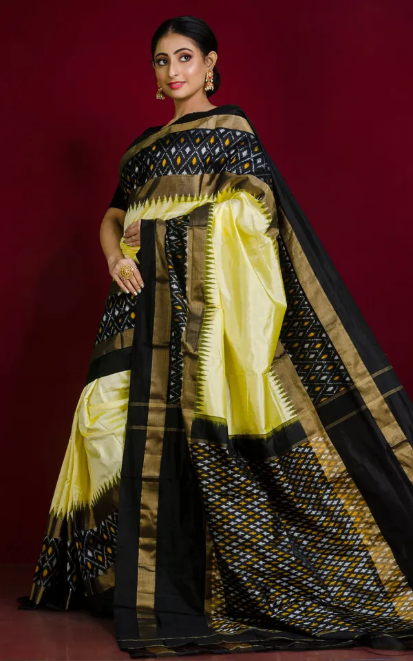 Designer_Skirt_Border_Ikkat_Pochampally_Silk_Saree_In_Cream_Black_And_Antique_Gold