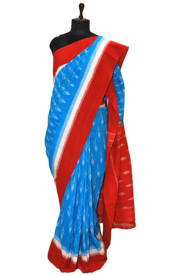 Soft_Mercerized_Cotton_Ikkat_Pochampally_Saree_In_Sky_Blue_Off_White_And_Orange