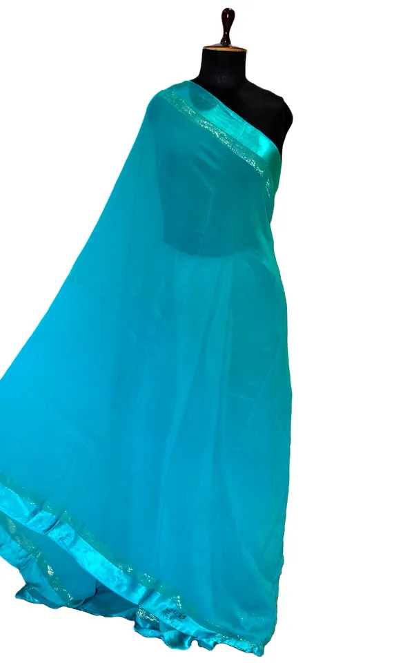 Designer_Dual_Shaded_Georgette_Saree_In_Sea_Green_And_Silver_Zari_Work
