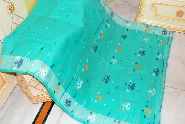 Traditional_Hand_Karat_Work_Cotton_Jamdani_Saree_In_Seagreen_Off_White_Black_And_Mustard_Thread_Work