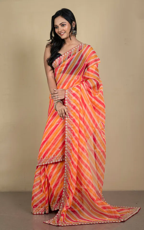 Bold_And_Fashionable_Soft_Organza_Zardozi_Silk_Saree_In_Dual_Tone_Orange_Peach_And_Beige
