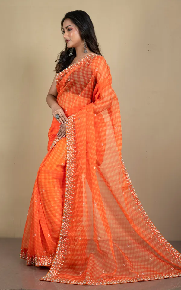 Bold_And_Fashionable_Soft_Organza_Zardozi_Silk_Saree_In_Orange_And_Beige