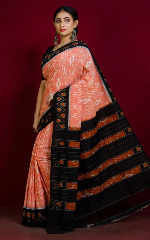 Soft_Mercerized_Cotton_Ikkat_Pochampally_Saree_In_Pale_Orange_Off_White_And_Black