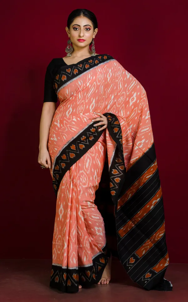 Soft_Mercerized_Cotton_Ikkat_Pochampally_Saree_In_Pale_Orange_Off_White_And_Black