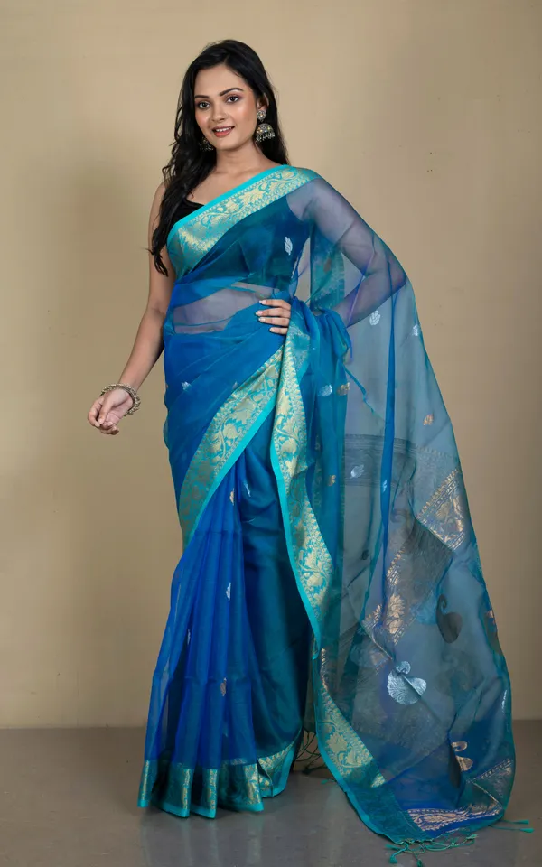 Soft_Muslin_Silk_Banarasi_Saree_In_Peacock_Blue_Baby_Blue_Golden_And_Silver_Zari_Work