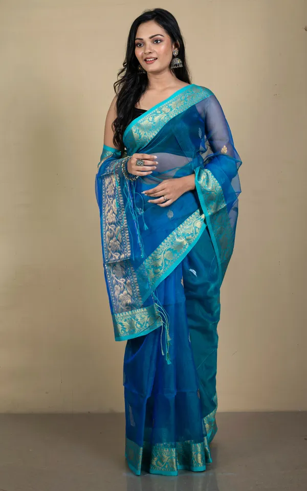Soft_Muslin_Silk_Banarasi_Saree_In_Peacock_Blue_Baby_Blue_Golden_And_Silver_Zari_Work