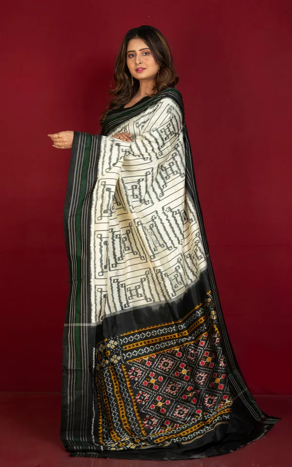Exclusive_Twill_Ikkat_Pochampally_Silk_Saree_With_Madhathasu_Pallu_In_Off_White_Black_Dark_Green_And_Multicolor