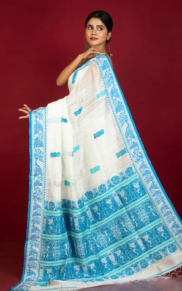 Premium_Quality_Double_Warp_Matka_Tussar_Baluchari_Silk_Saree_In_Off_White_Blue_And_Green