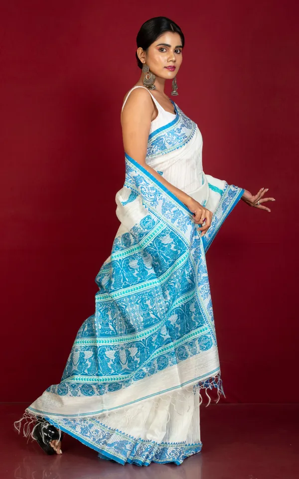 Premium_Quality_Double_Warp_Matka_Tussar_Baluchari_Silk_Saree_In_Off_White_Blue_And_Green