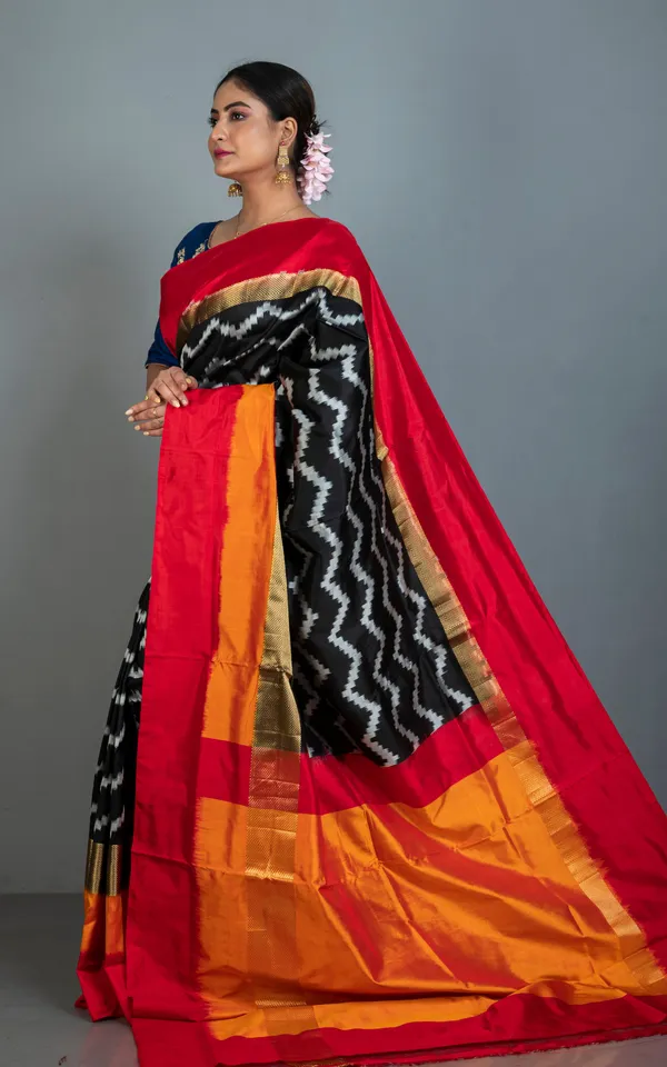 Designer_Skirt_Border_Ikkat_Pochampally_Silk_Saree_In_Black_Off_White_Red_Fire_Orange_And_Antique_Golden