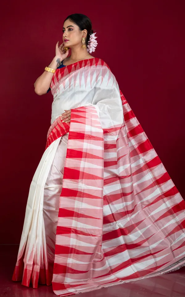 Bishnupuri_Double_Ikkat_Pure_Silk_Saree_In_White_And_Red