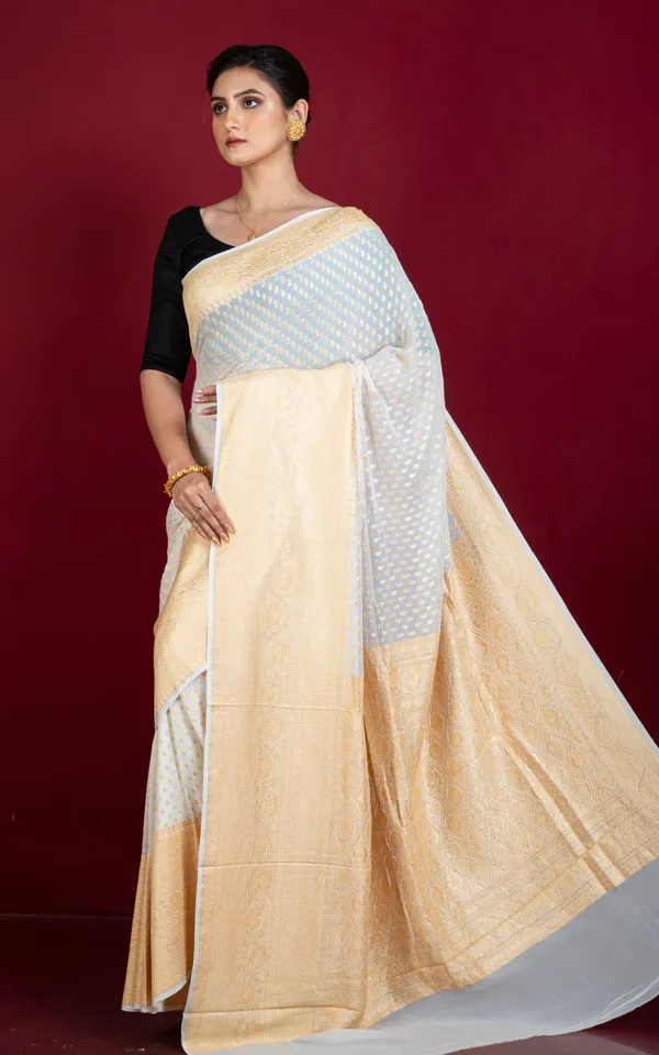 Hand_Woven_Nakshi_Skirt_Border_Khaddi_Georgette_Banarasi_Saree_In_Off_White_And_Muted_Gold