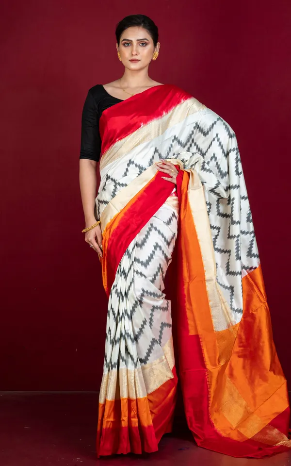 Designer_Skirt_Border_Ikkat_Pochampally_Silk_Saree_In_Off_White_Red_Fire_Orange_Black_And_Antique_Golden