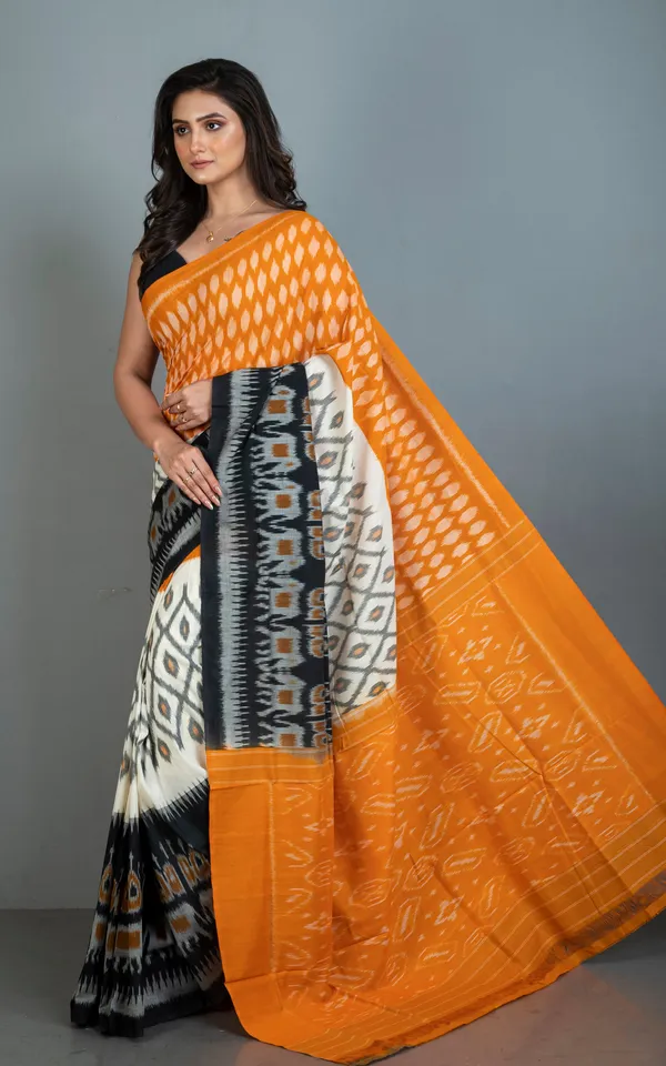 Soft_Mercerized_Cotton_Ikkat_Pochampally_Saree_In_Orange_Off_White_And_Black
